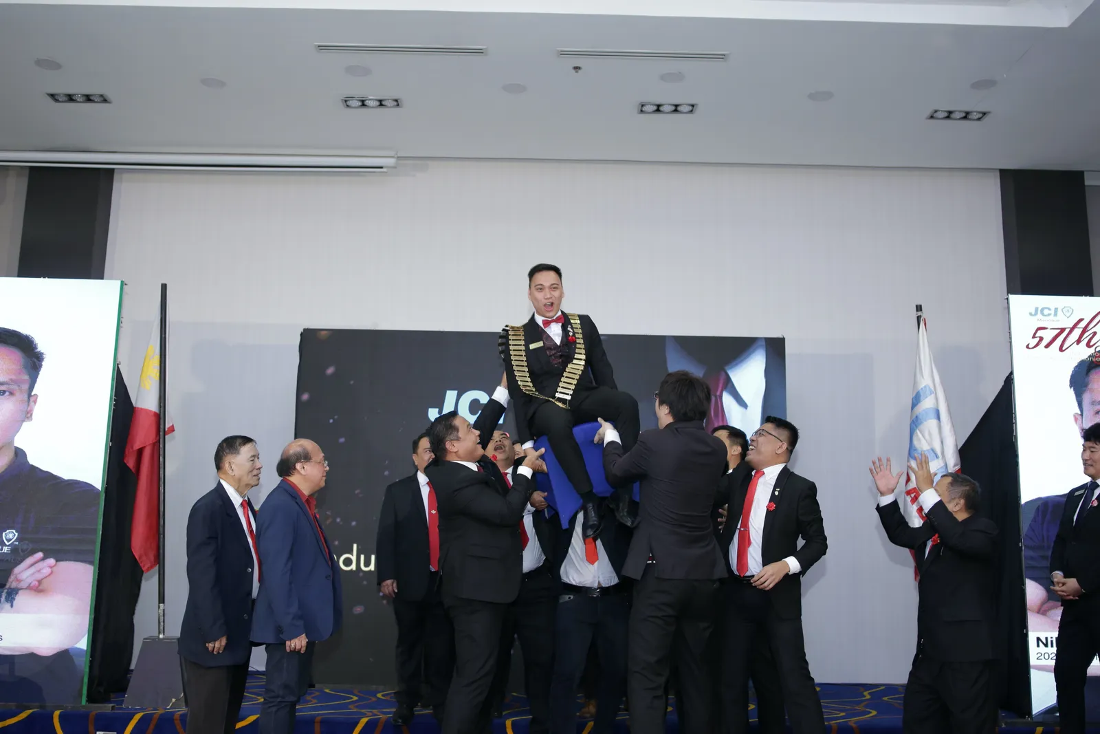 Traditional chair toss by the Past Presidents and members JCI Mandaue. Symbolizes the President’s trust placed on the members.
